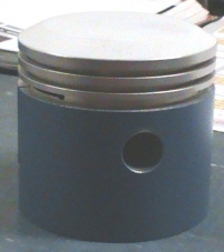 Teflon coated Model T piston